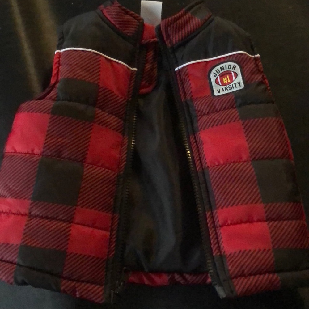 Red and black checkered vest
